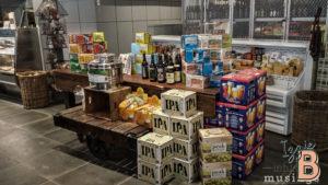 Colorful assortment of craft beers and beverages on display in retail store.