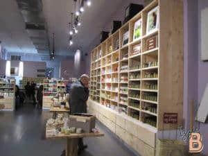 Brightly lit interior showcasing a variety of store displays and products.