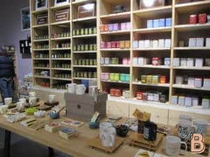 Vibrant tea boxes and mugs showcase wide selection of flavored teas at Izzie Bytes.