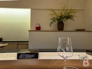 Elegant glassware and contemporary decor in a cozy dining space.