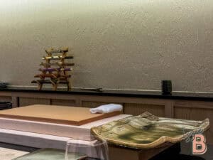 A serene spa room with massage tables, candles, and calming decor perfect for relaxation.