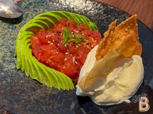 Fresh tuna tartare with avocado and crispy chip, served with cream cheese.